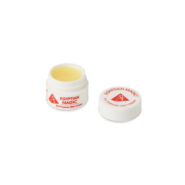 0.25 oz mini jar of Egyptian Magic with the lid open